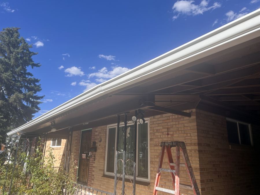 Front eaves after, repainted with white gutters