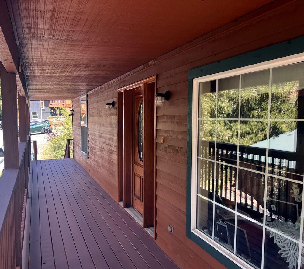 Stained porch deck, railings and siding